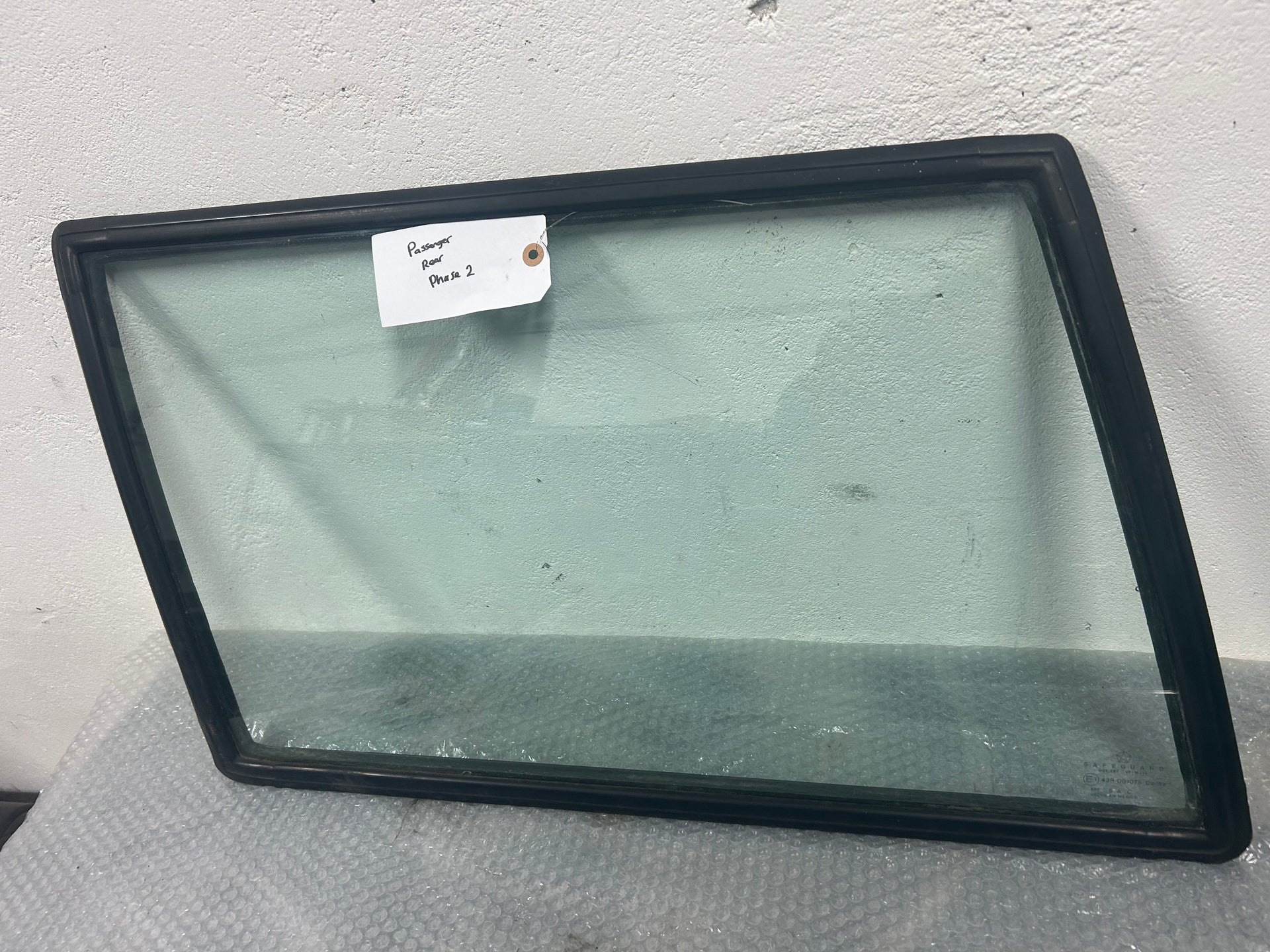 Passenger side rear glass